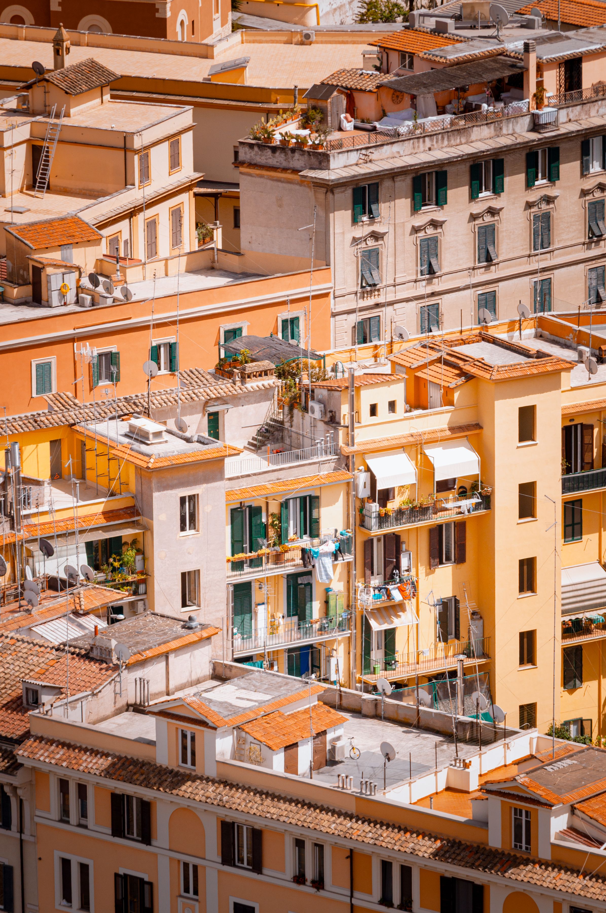 View of vibrant residential buildings in Rome, Italy, showcasing architectural diversity and urban scenery.