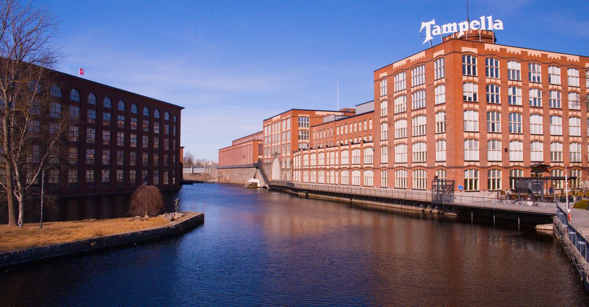 View of the iconic Tampella building along the Tammerkoski in Tampere, Finland.