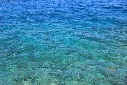 Free Captivating image of clear blue sea water in Greece, showcasing natural beauty and tranquility. Stock Photo