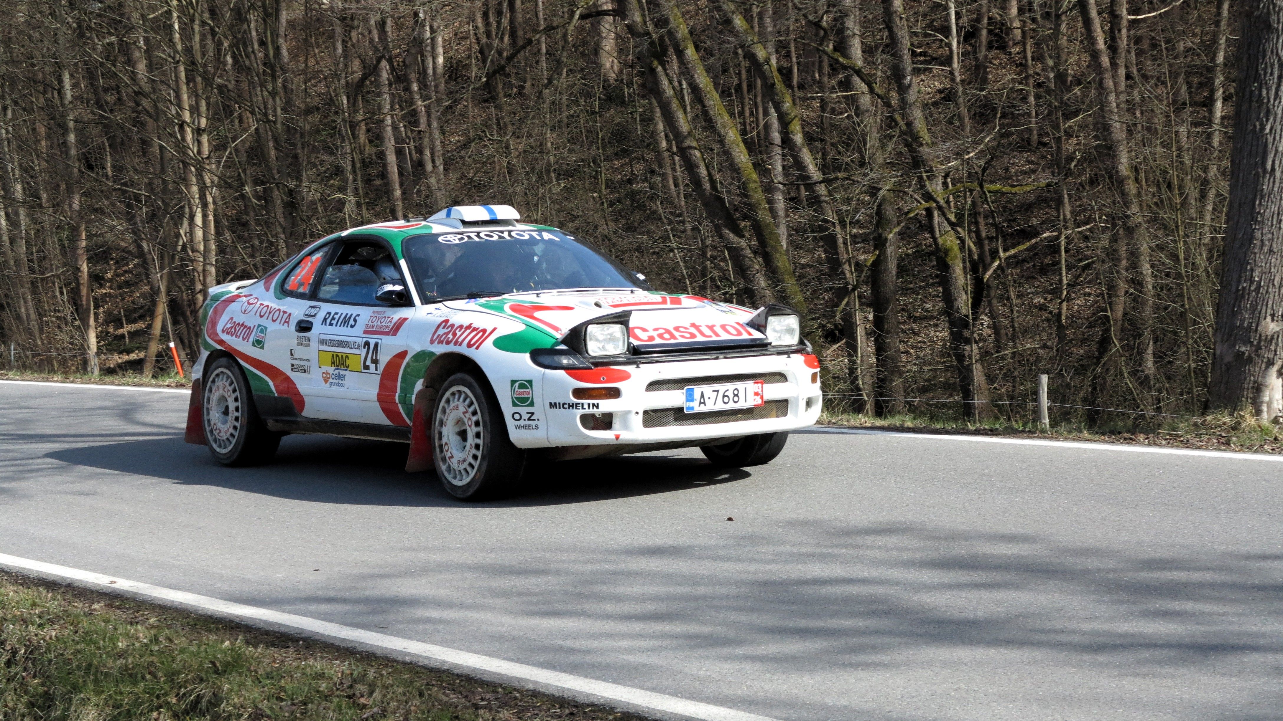 Rally Car Racing on Forest Road · Free Stock Photo