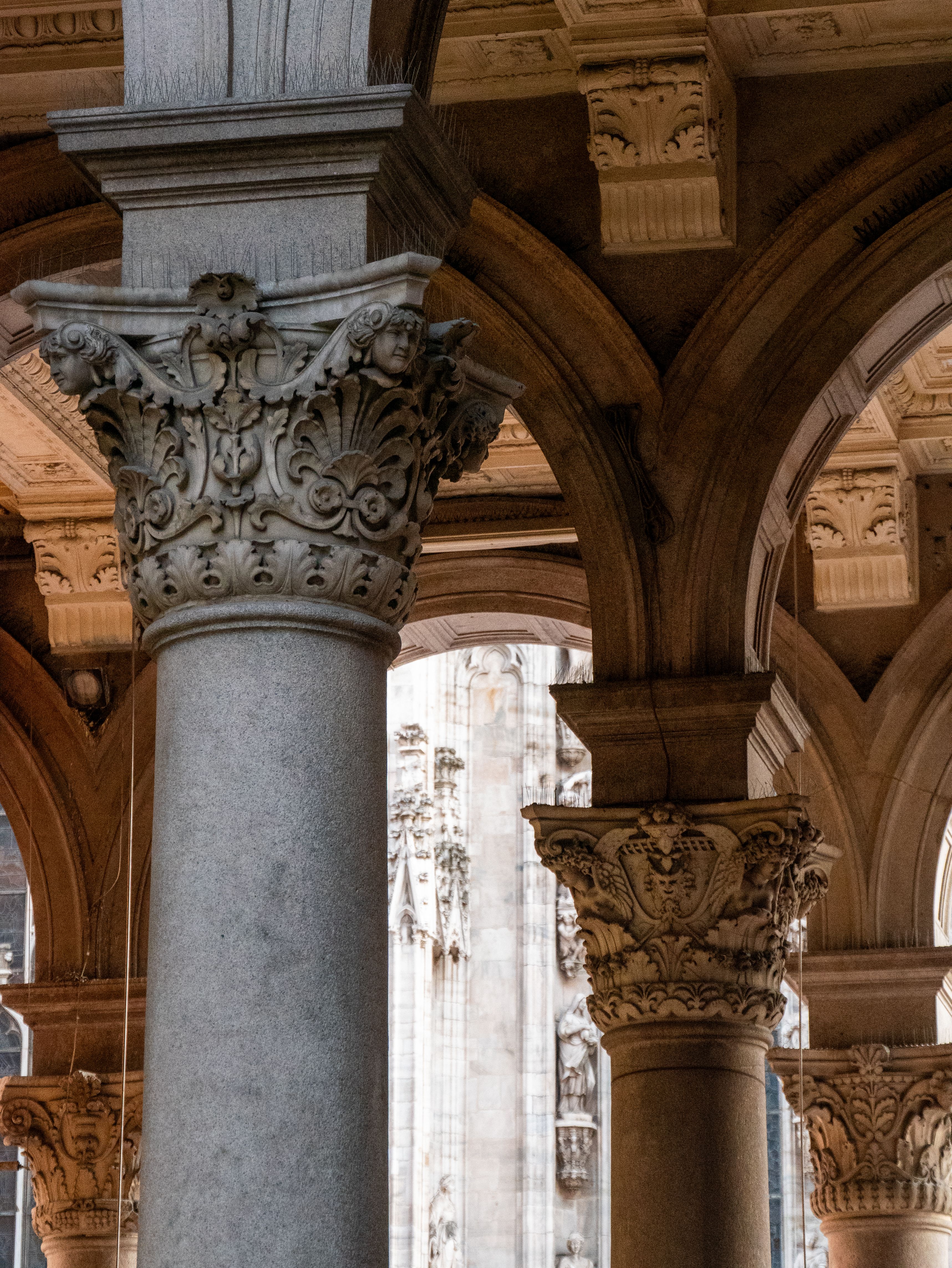 Elegant Architectural Columns with Ornate Details · Free Stock Photo