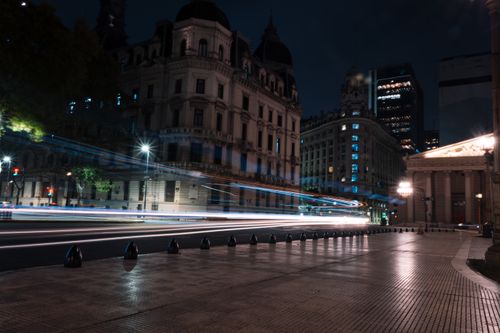 Free Captivating night scene of light trails captured in Buenos Aires showcasing classic architecture. Stock Photo