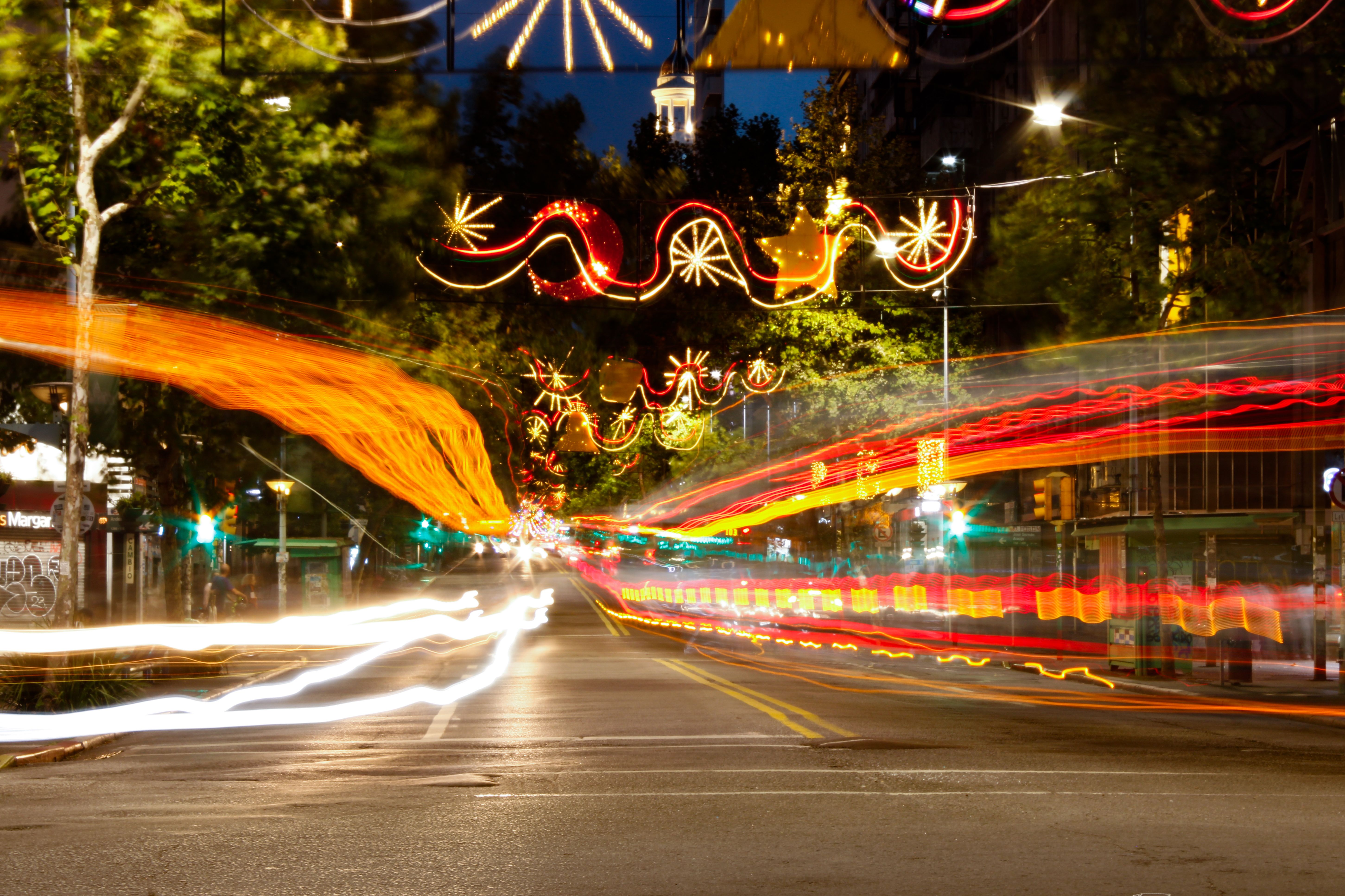Vibrant City Street with Motion Light Trails at Night · Free Stock Photo