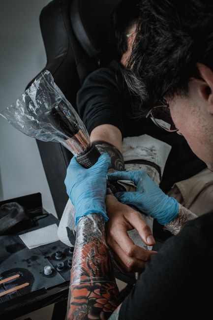 Sessão de Tatuagem