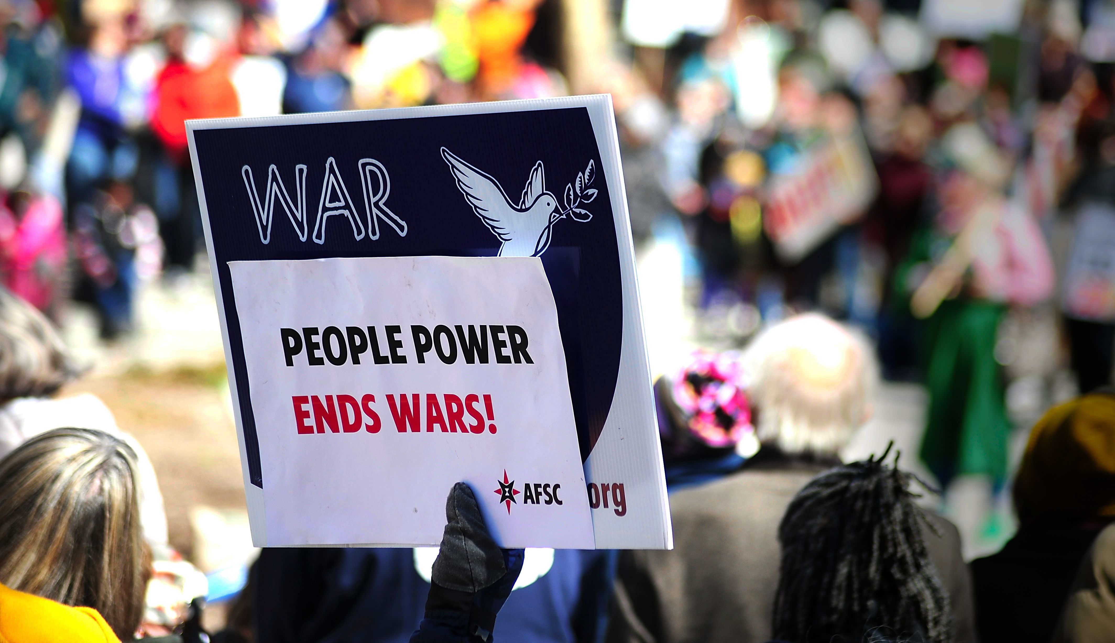 Anti-War Protest Sign at Baltimore Rally · Free Stock Photo