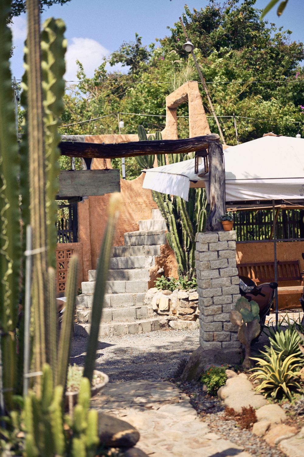 Rustic outdoor living area with natural stone surfaces