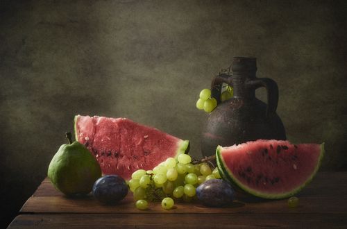 Fruit still life on a bare table — photo by Matvei on Pexels