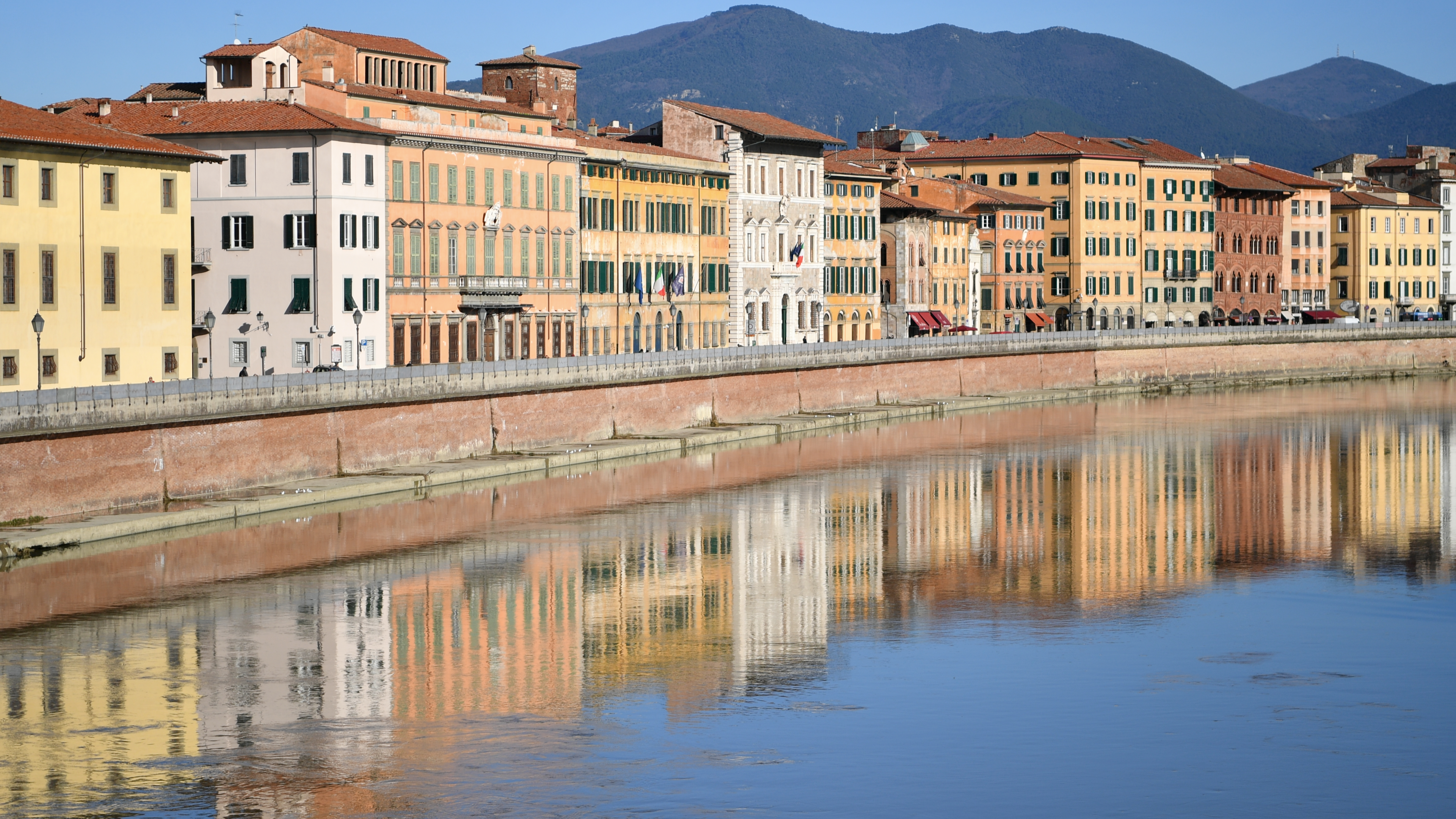Colorful Italian Riverside Architecture in Pisa · Free Stock Photo