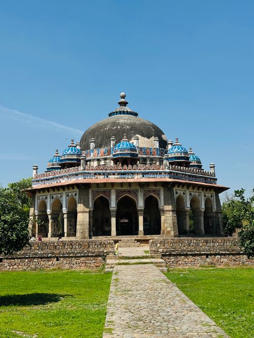 Free Photograph of the historic Isa Khan's Tomb in New Delhi, showcasing its iconic architecture. Stock Photo