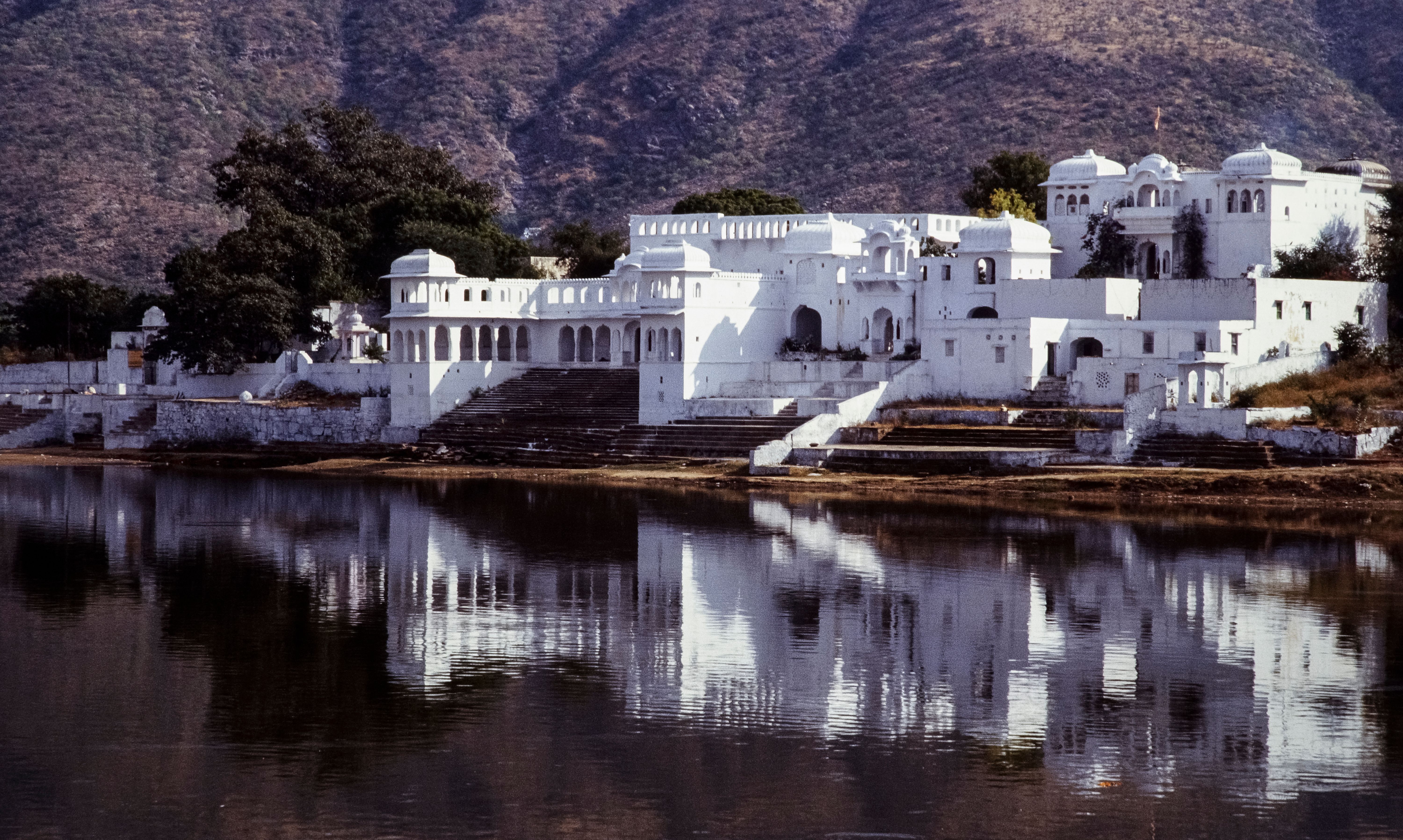 City palace and lake in Alwar with the Aravalli hills behind