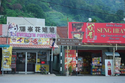 Shops near Kek Lok Si Temple, Ayer Itam, Penang, including Everlyn Popcorn and Seng Heang.