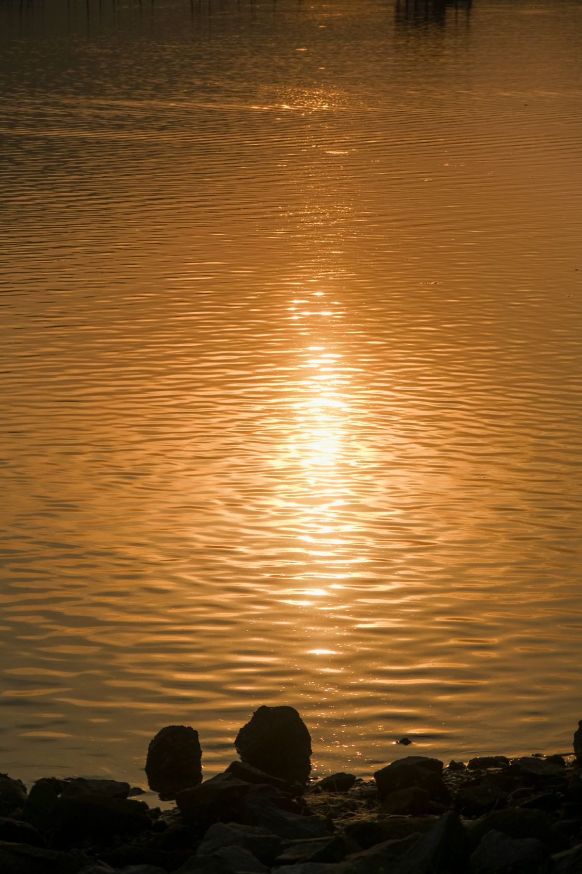 Sunset reflected on the Perfume River in Hue