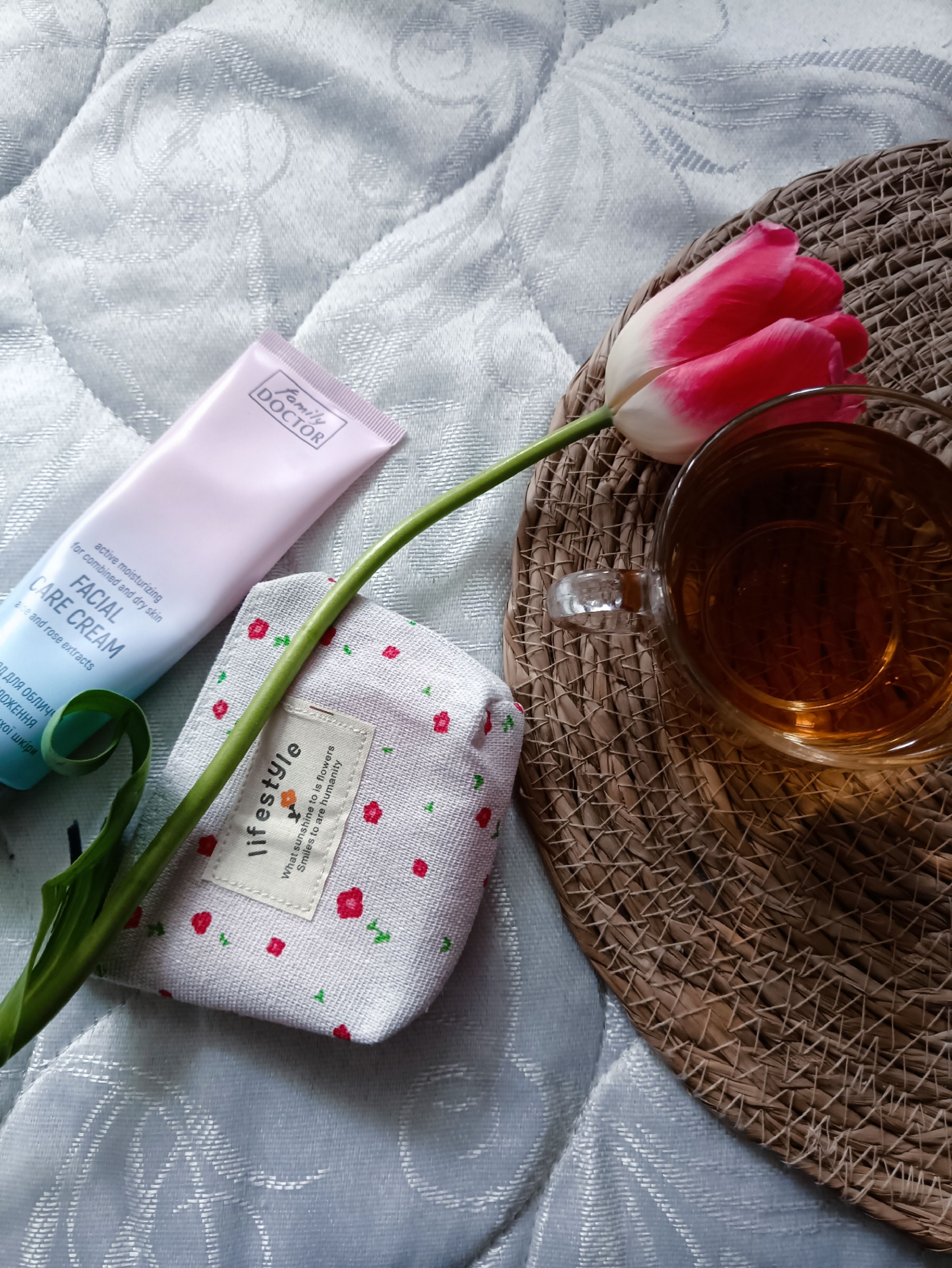 Cozy Flat Lay with Tea, Tulip, and Skincare · Free Stock Photo