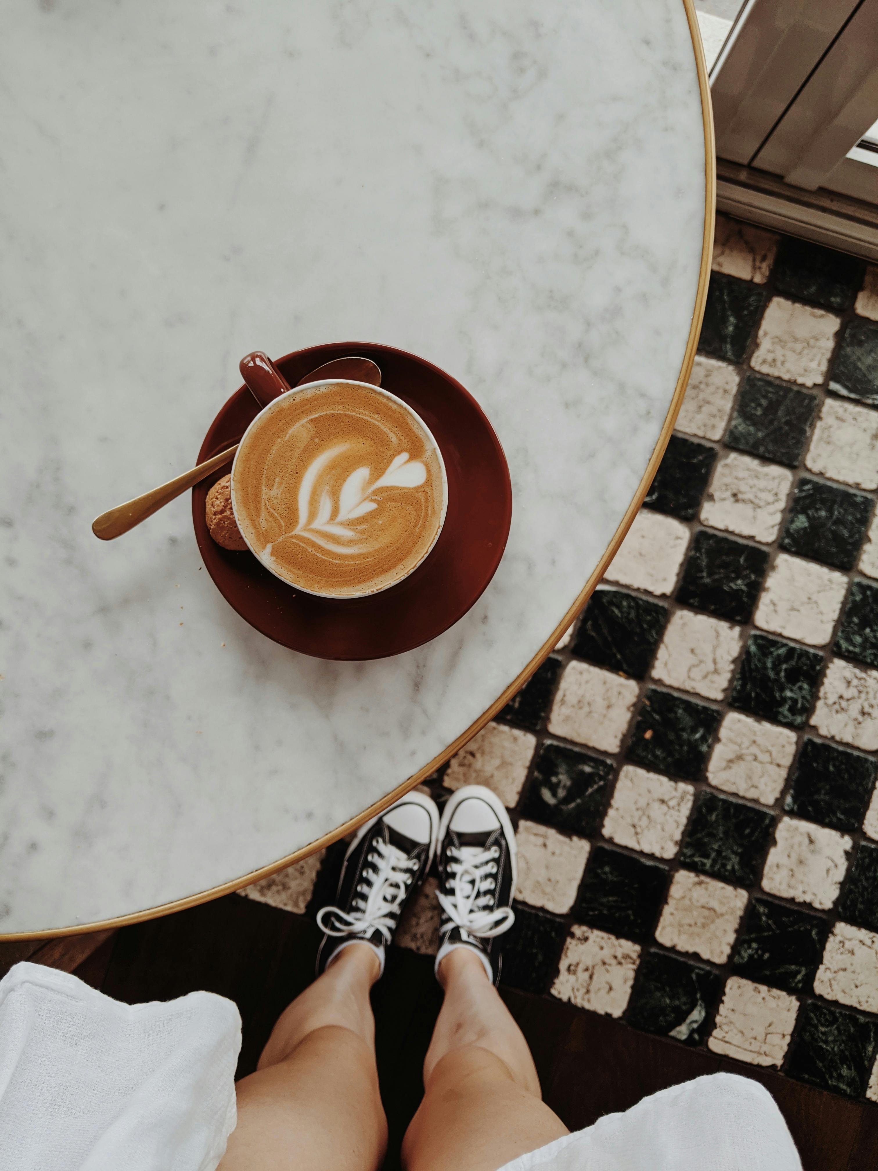 a coffee drink with steamed milk