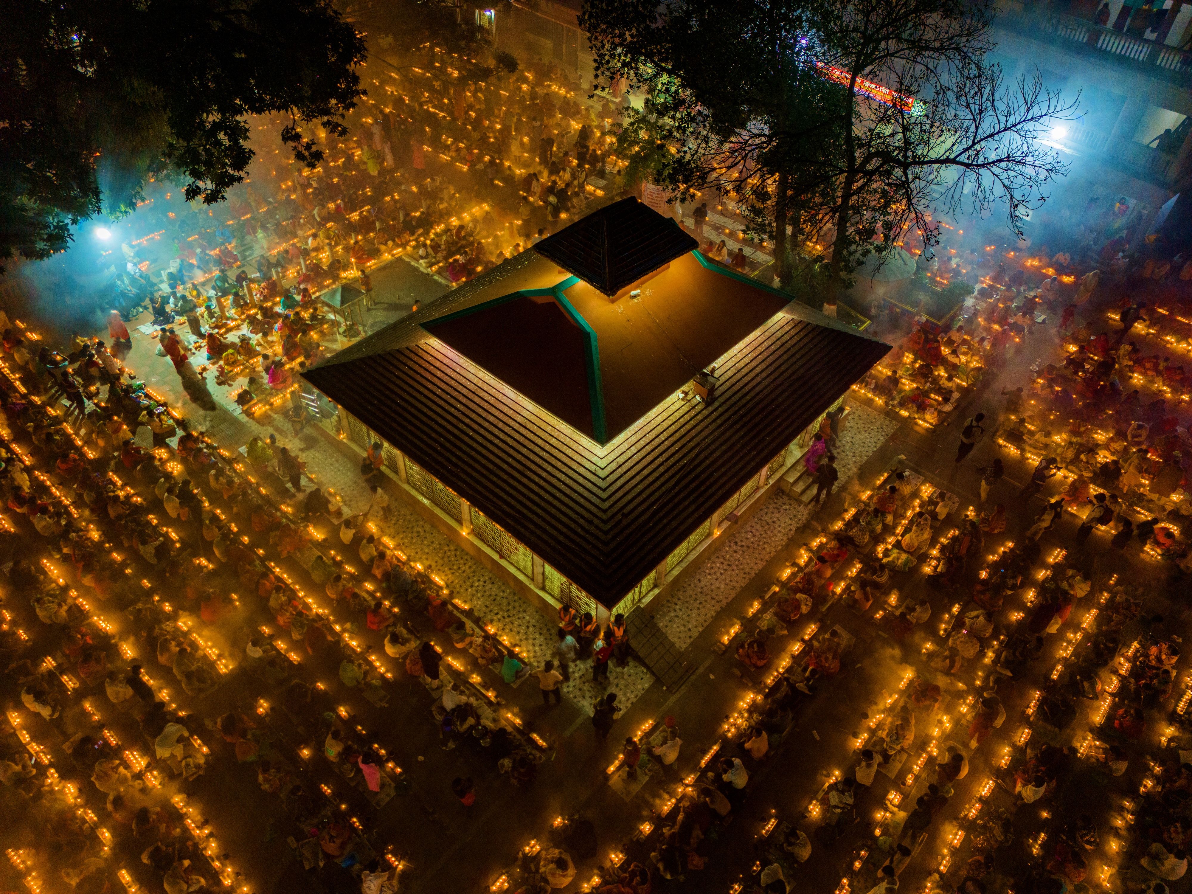 Aerial View of Nighttime Candlelight Festival Gathering · Free Stock Photo