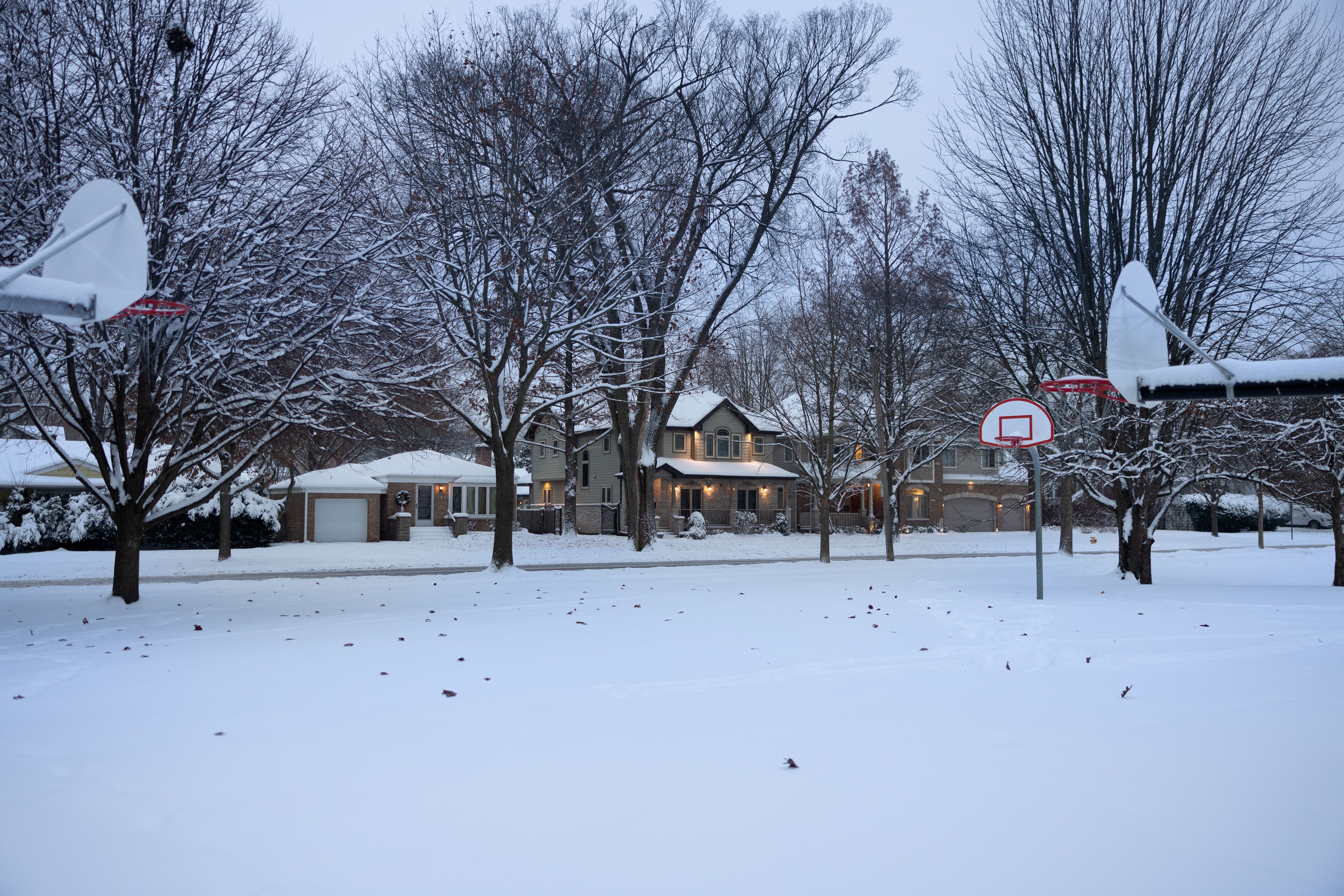 basketball hoop driveway dusk