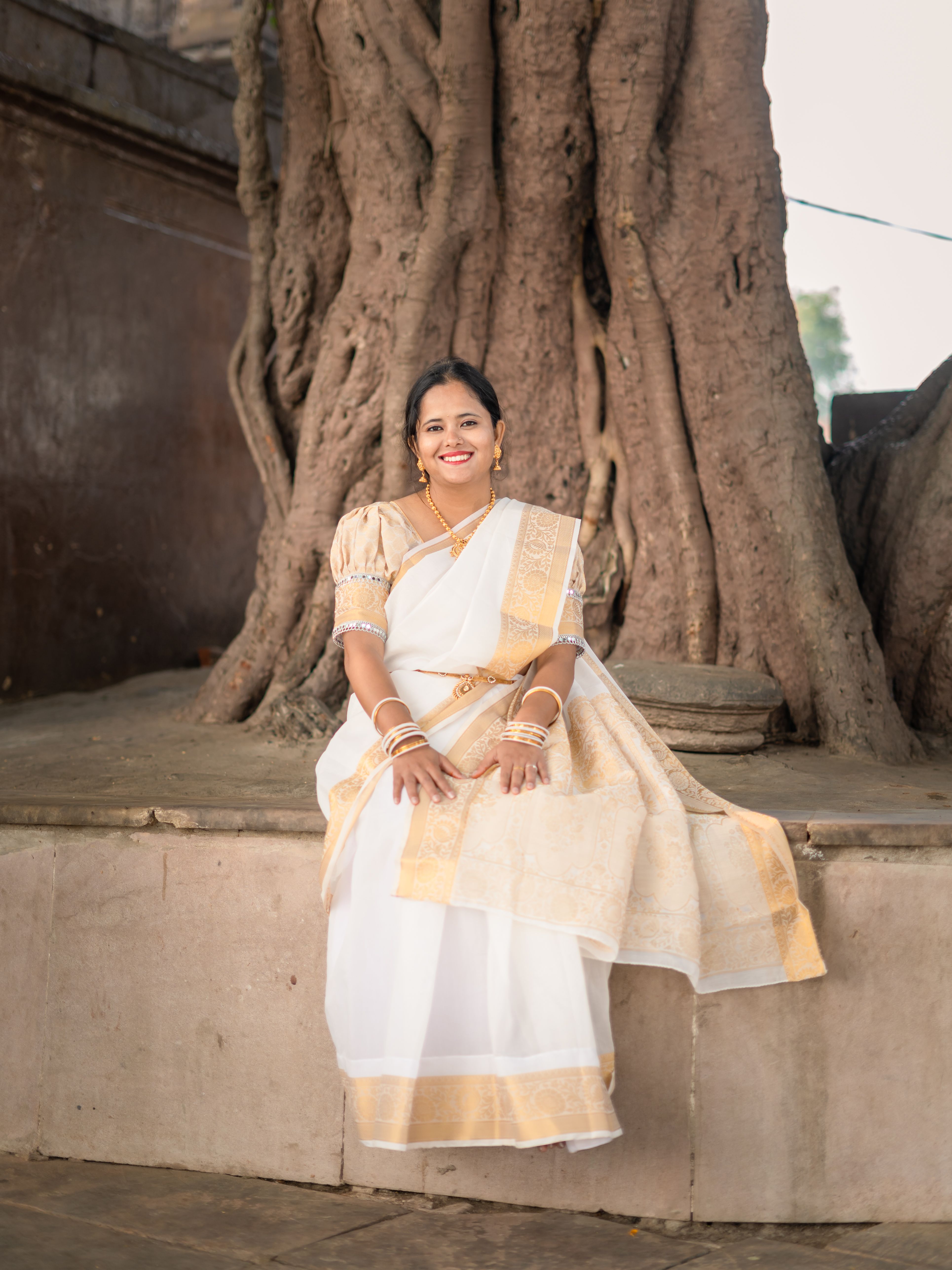 Elegant Indian Woman in Traditional Saree Outdoors · Free Stock Photo