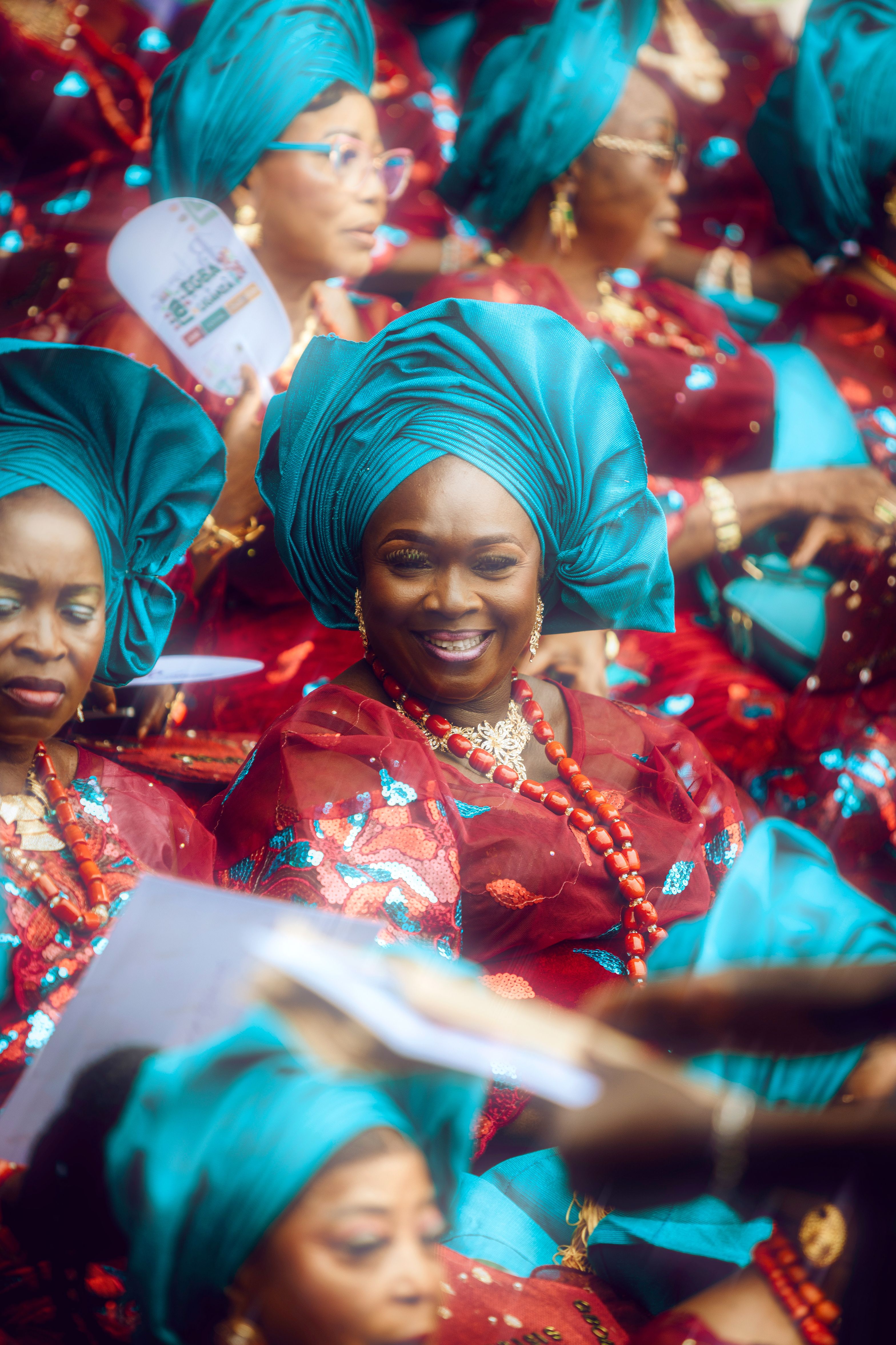 Colorful display of Nigerian women in traditional attire during a festival in Lagos.