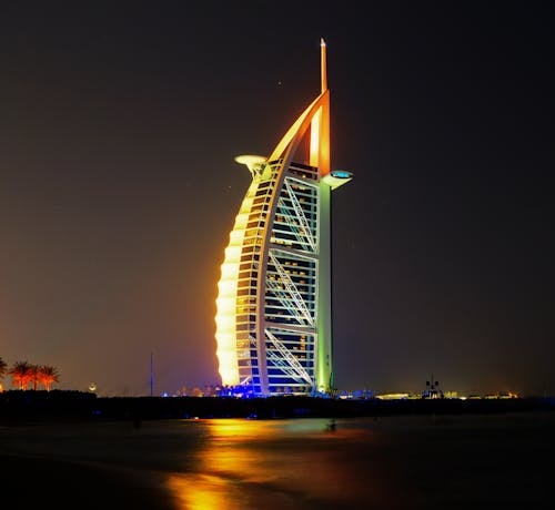 Free Architectural Building Lighted on Night Time Stock Photo