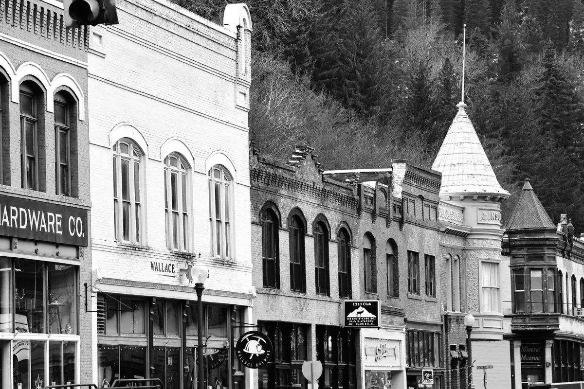 Historic downtown storefronts along a railroad town street