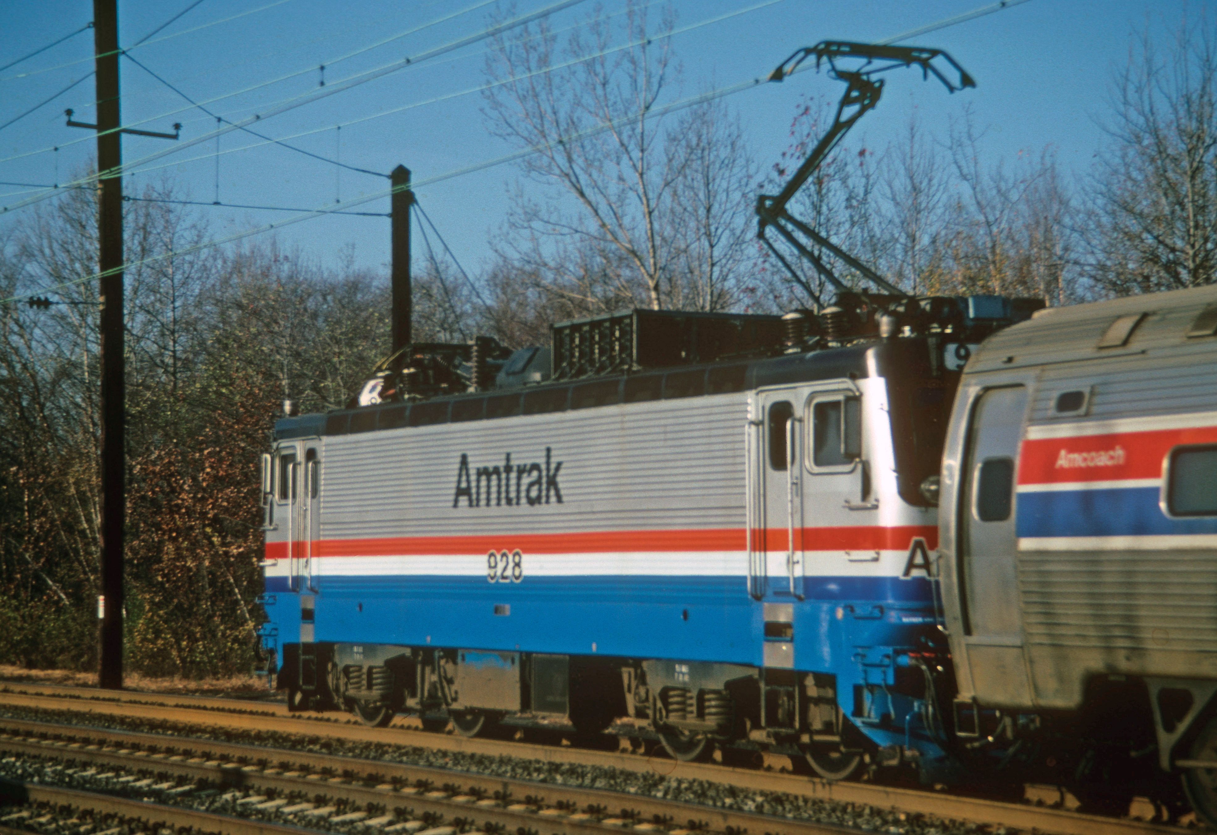 Amtrak train passing through West Windsor Township, New Jersey on a clear day.