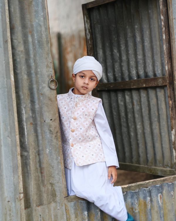 Authentic Boy Young Boy in Traditional Attire by Rusty Gate · Free Stock Photo