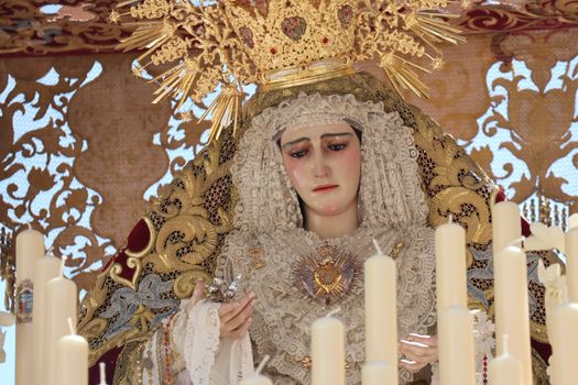 Intricate statue of Virgin Mary during Semana Santa in Cádiz, Spain.