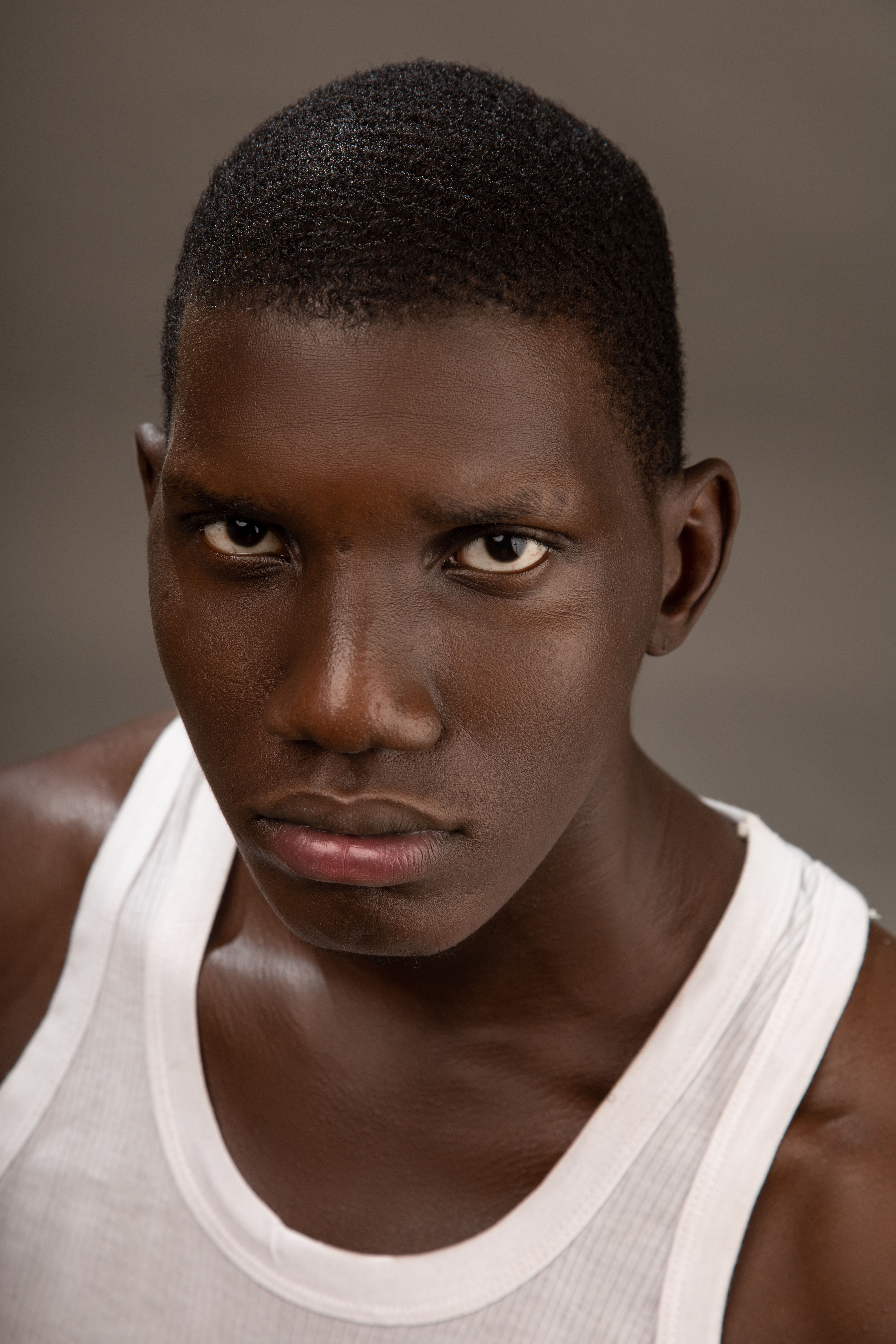 Close-up Portrait of a Contemplative Young Man · Free Stock Photo