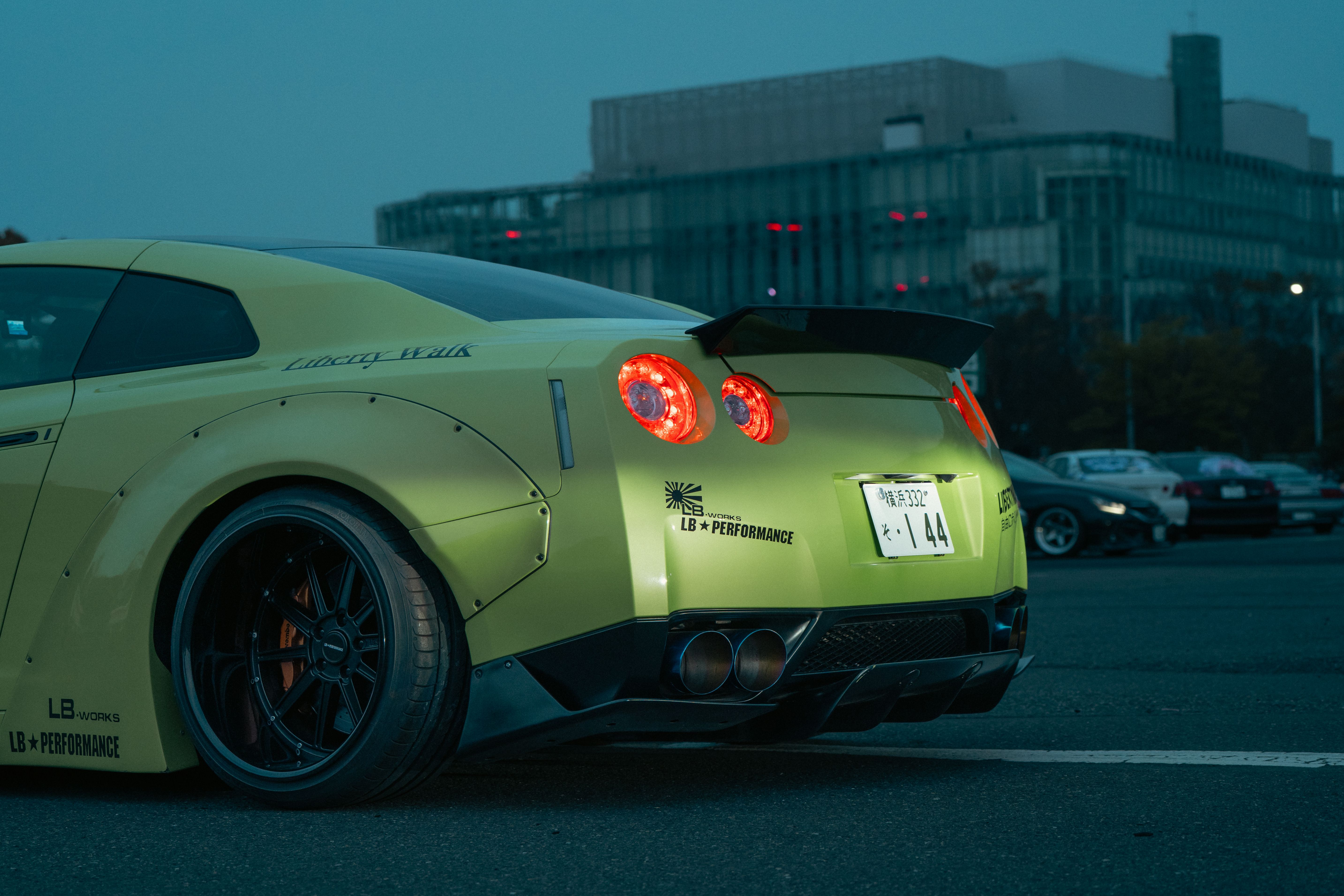 Modified Sports Car in Tokyo Evening Scene · Free Stock Photo