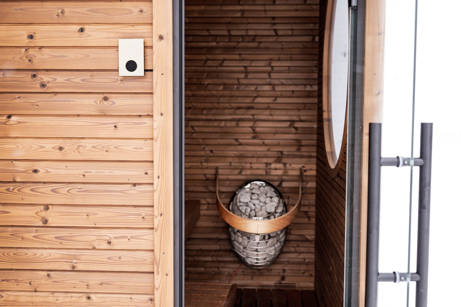 Modern wooden sauna with heater