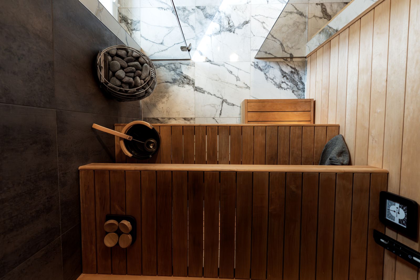 Modern wooden sauna interior, representing a regular heat-based wellness habit.