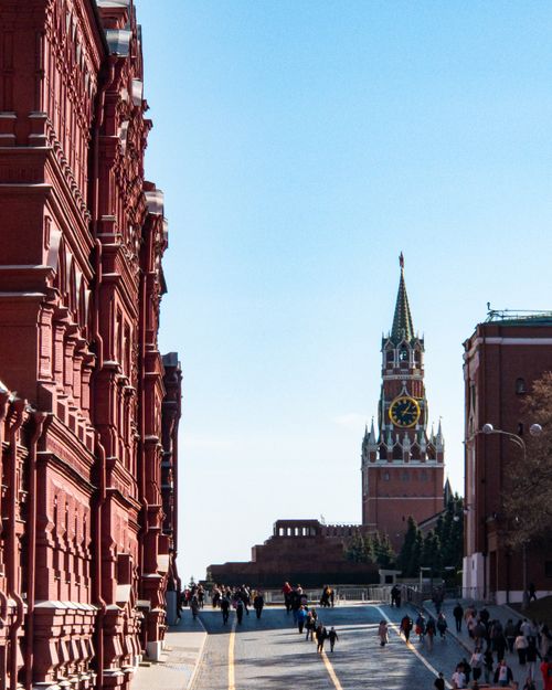 Free A bustling day at Red Square in Moscow featuring the iconic Spasskaya Tower. Stock Photo