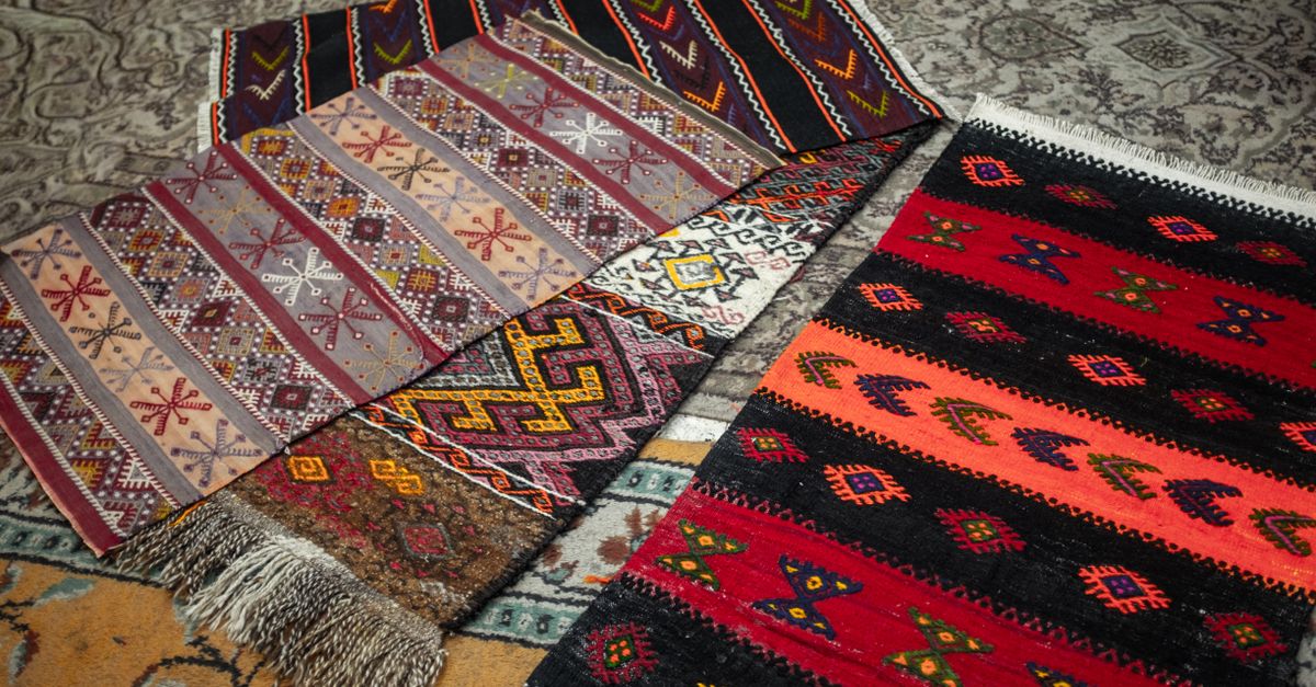 Traditional Rug Textile Traditional Handwoven Rugs with Colorful Patterns · Free Stock Photo