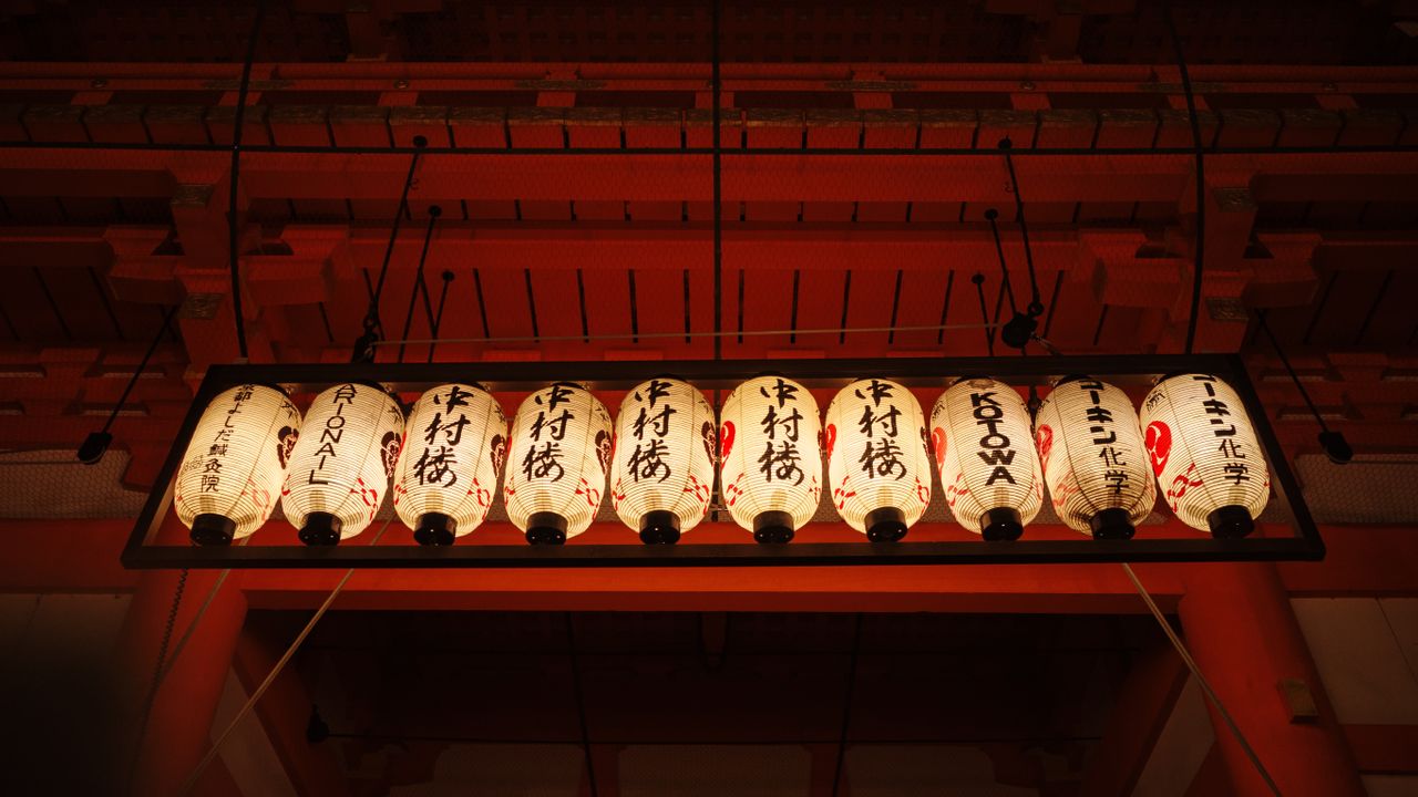 elegant paper lanterns adorn a kyoto temple showcasing traditional jap