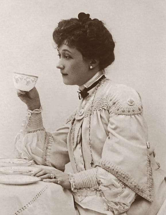 Free Classic Photo of a Woman Holding a Tea Cup Stock Photo