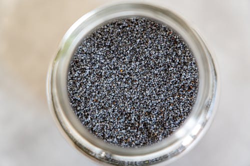 Free Tiny Size Of Seeds Inside Of A Jar Stock Photo