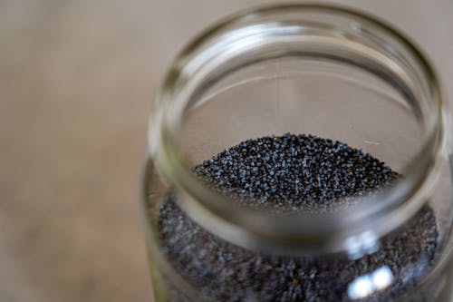 Free Poppy Seeds in Clear Glass Jar Stock Photo