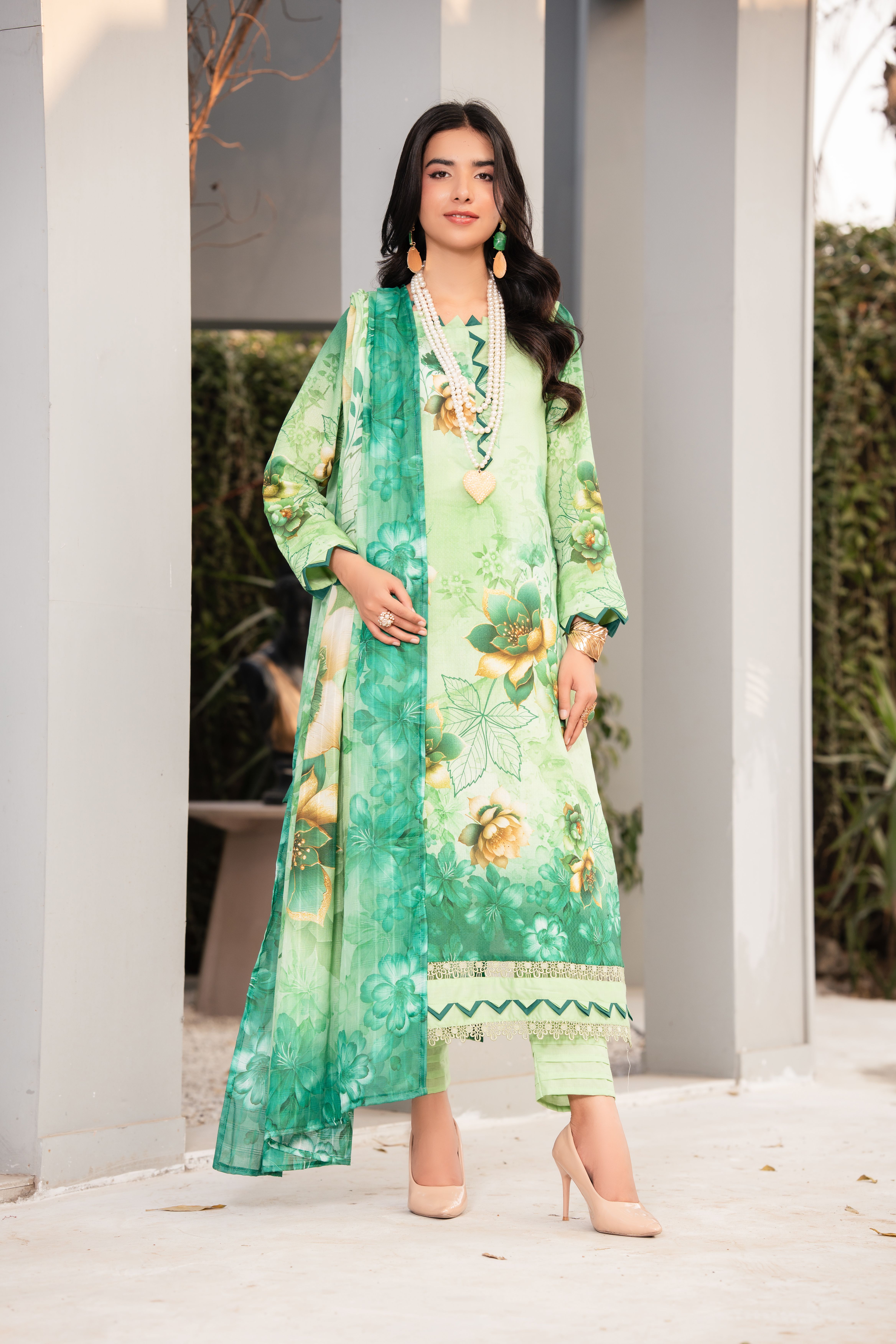 Elegant Woman in Floral Traditional Dress Outdoors · Free Stock Photo