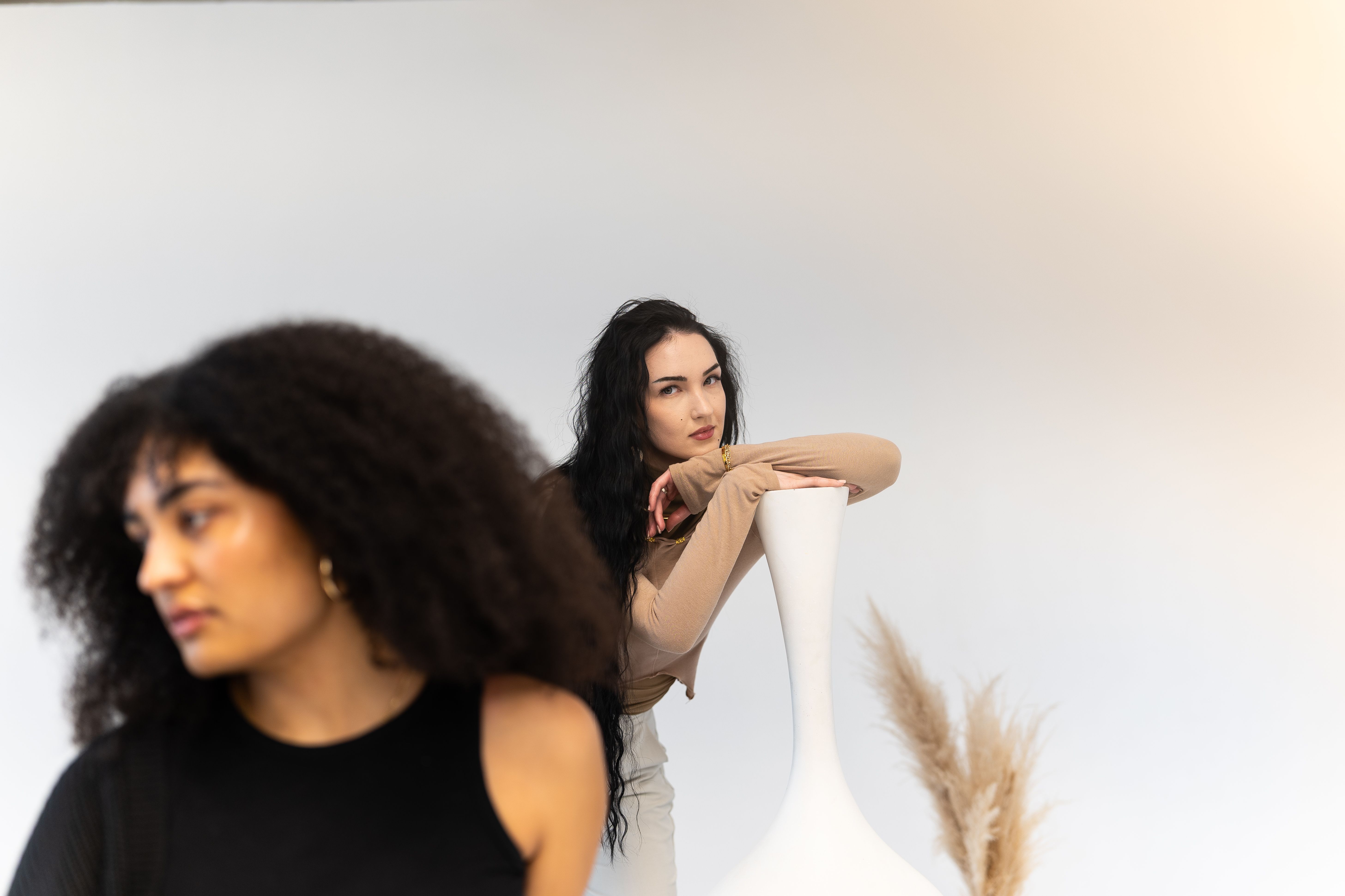 Professional Photo Shoot with Two Models in Studio · Free Stock Photo