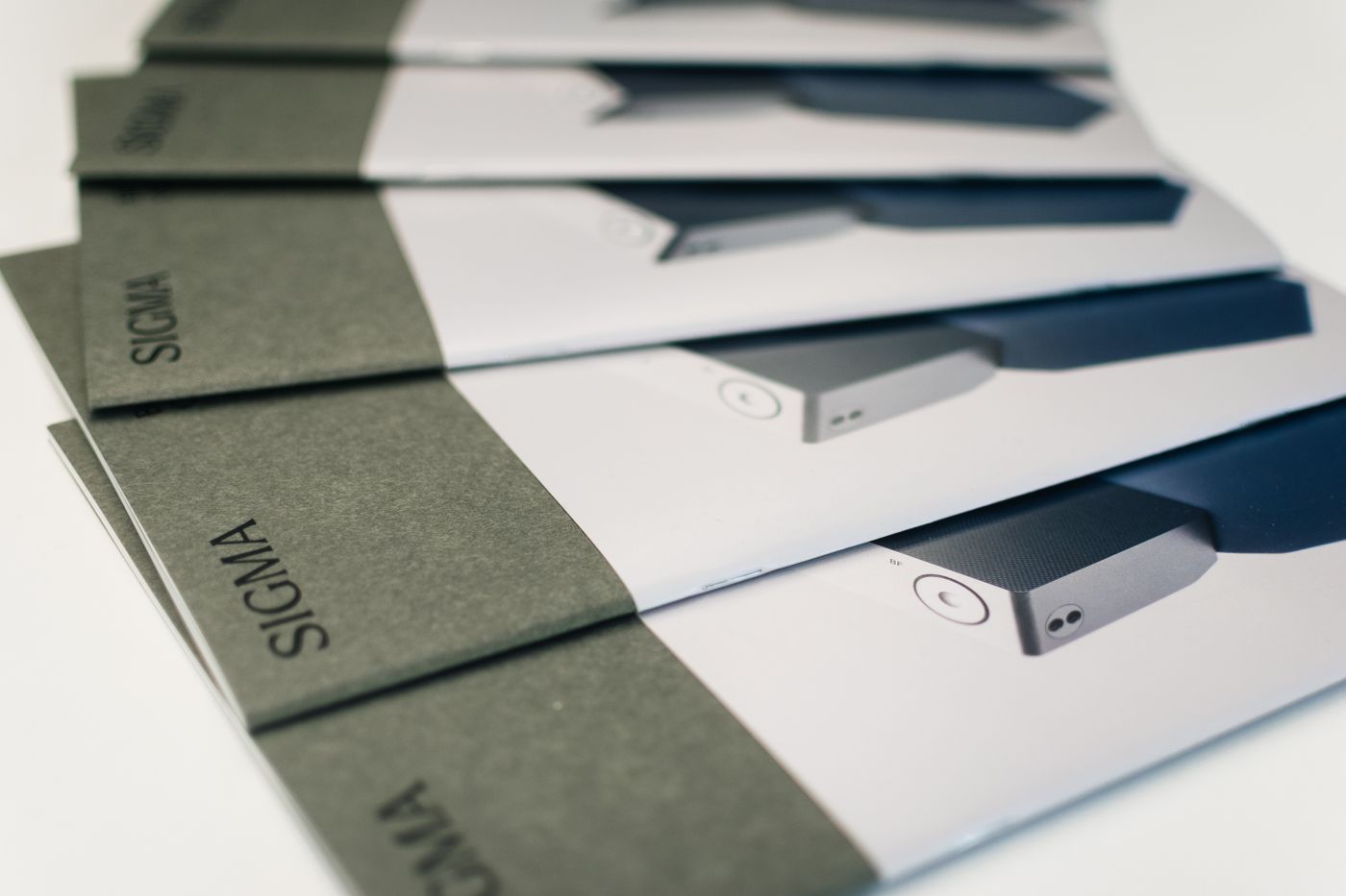 Close-up of folded printed brochures showing layout and design