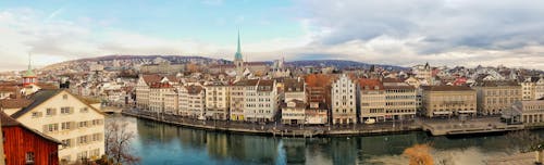 Kostenloses Stock Foto zu bewölkter himmel, brücke, dom