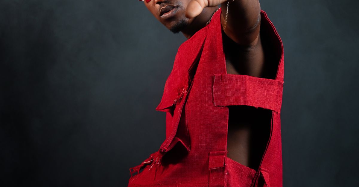 Person In Red Fashionable individual in striking red attire · Free Stock Photo