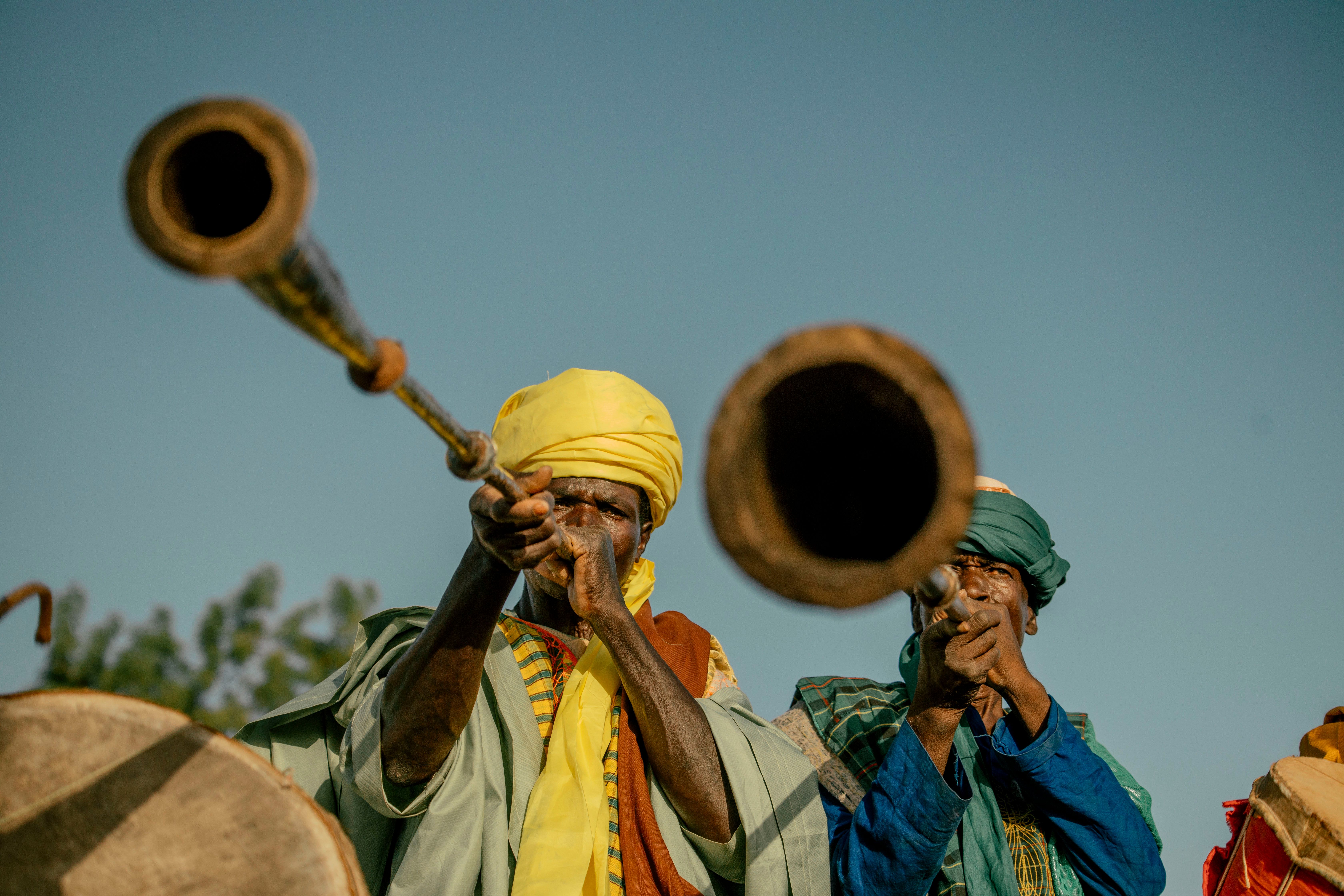 Vibrant traditional musicians with horns, Mali