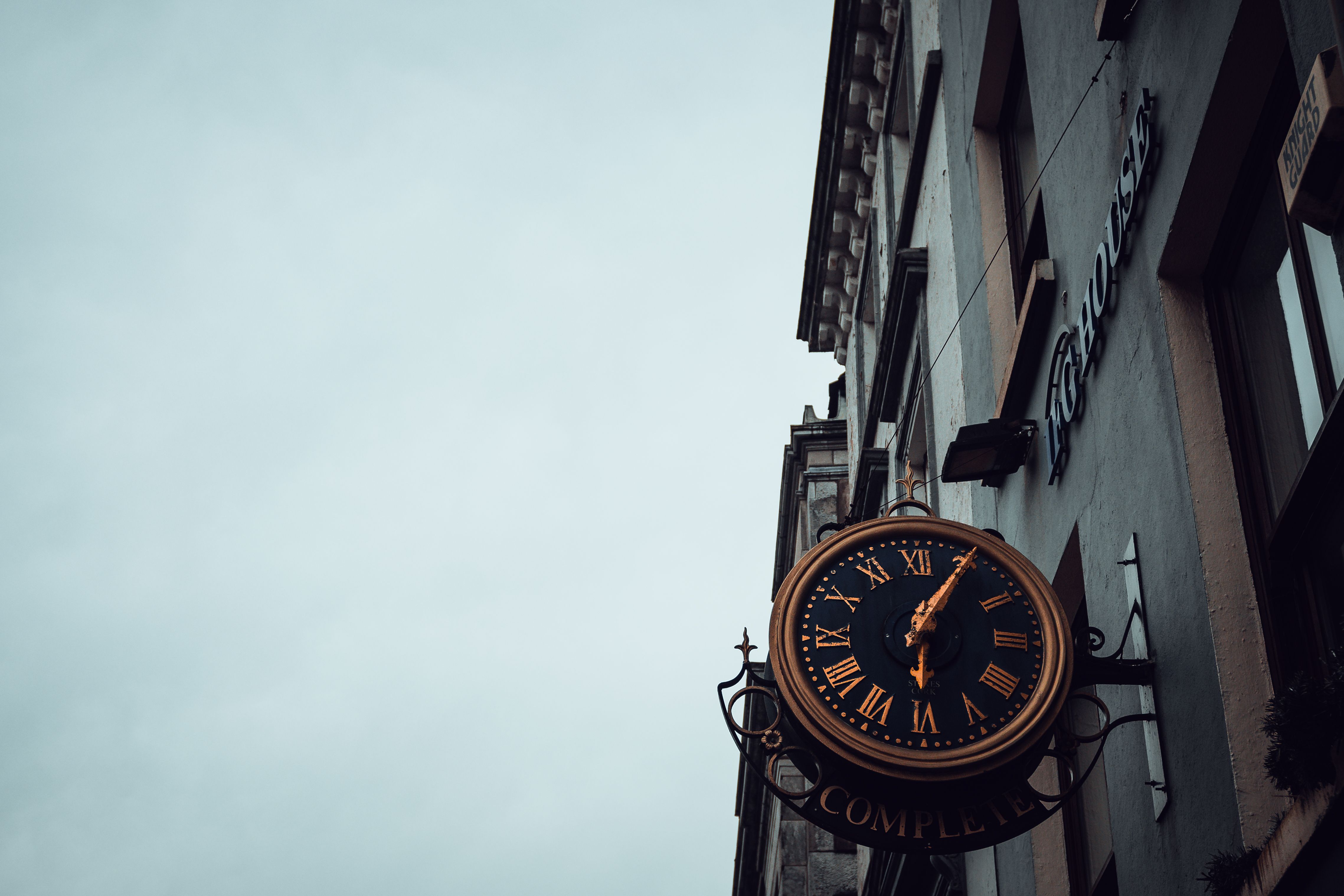 Vintage Clock on European Street Building · Free Stock Photo
