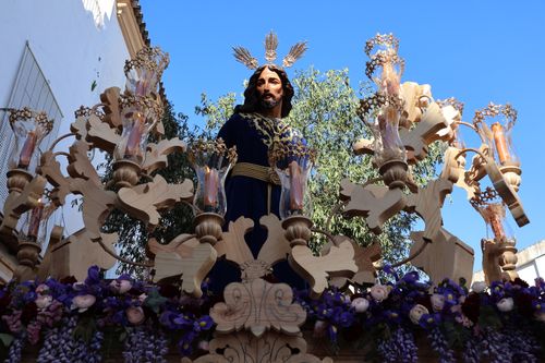 Free A religious statue in an ornate Easter procession in El Puerto de Santa María, Spain. Stock Photo
