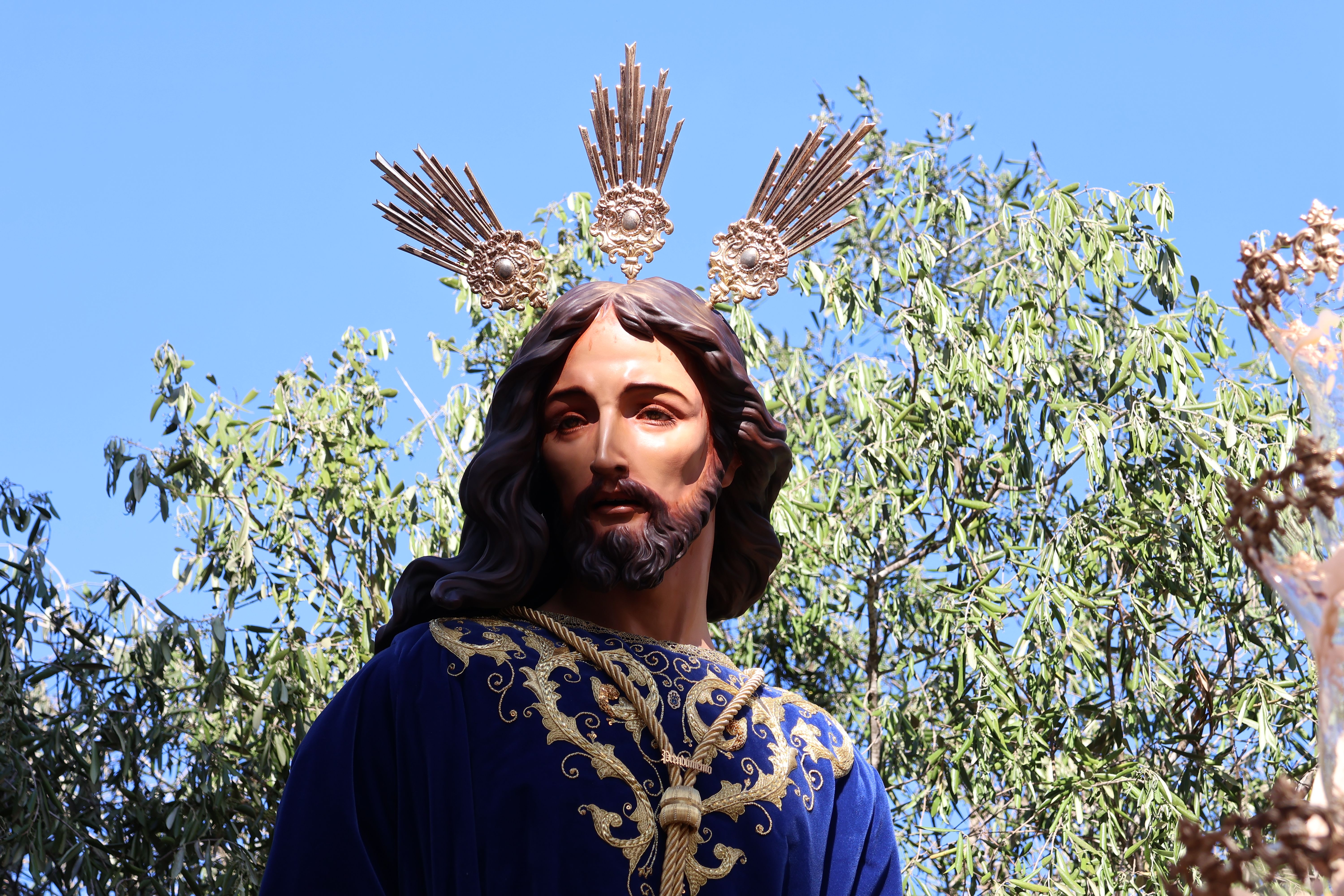 Traditional religious statue in a Semana Santa procession in El Puerto de Santa María, Spain.