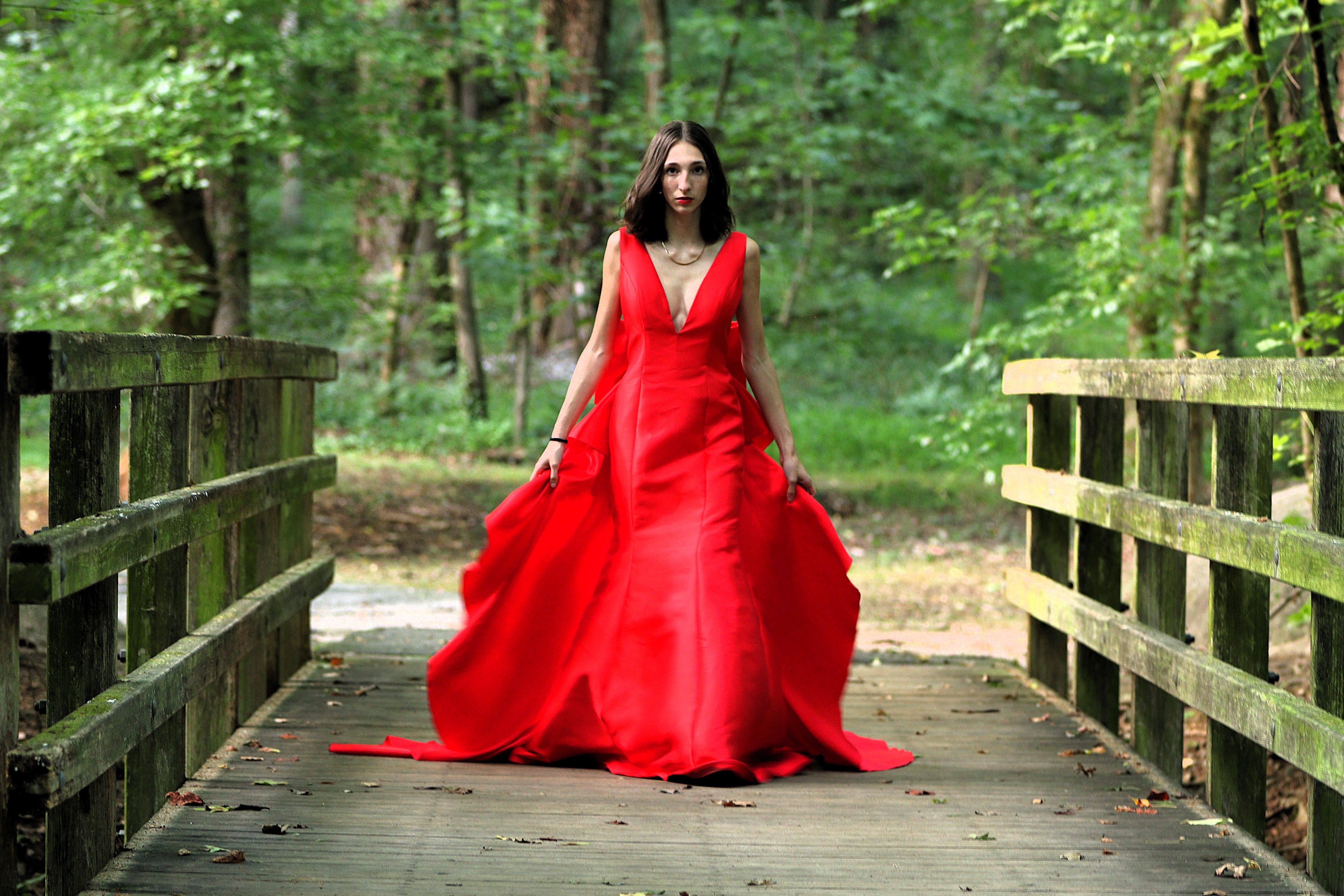 Woman in Red Dress on Wooden Bridge in Forest · Free Stock Photo