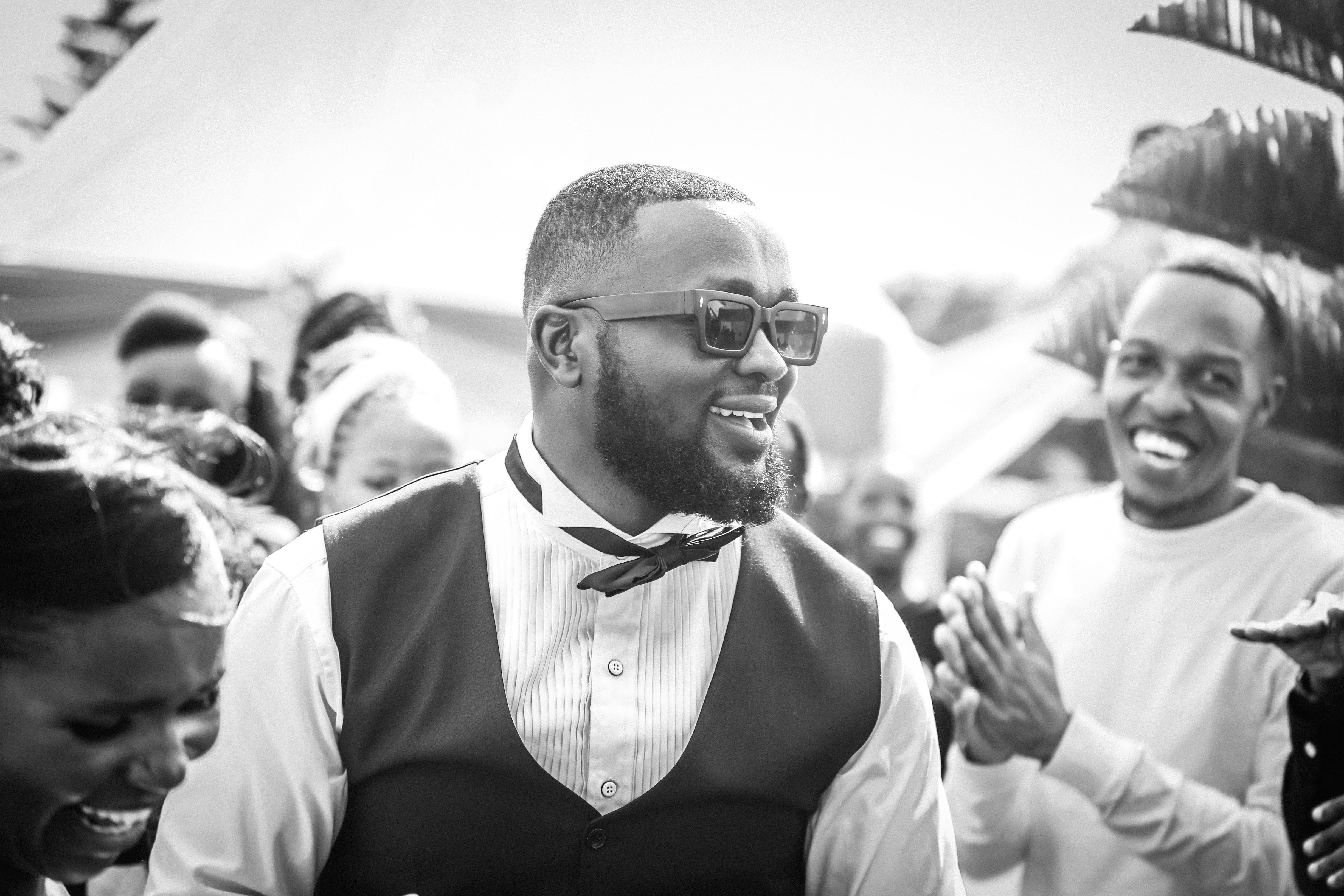 Joyful Outdoor Celebration in Black and White · Free Stock Photo