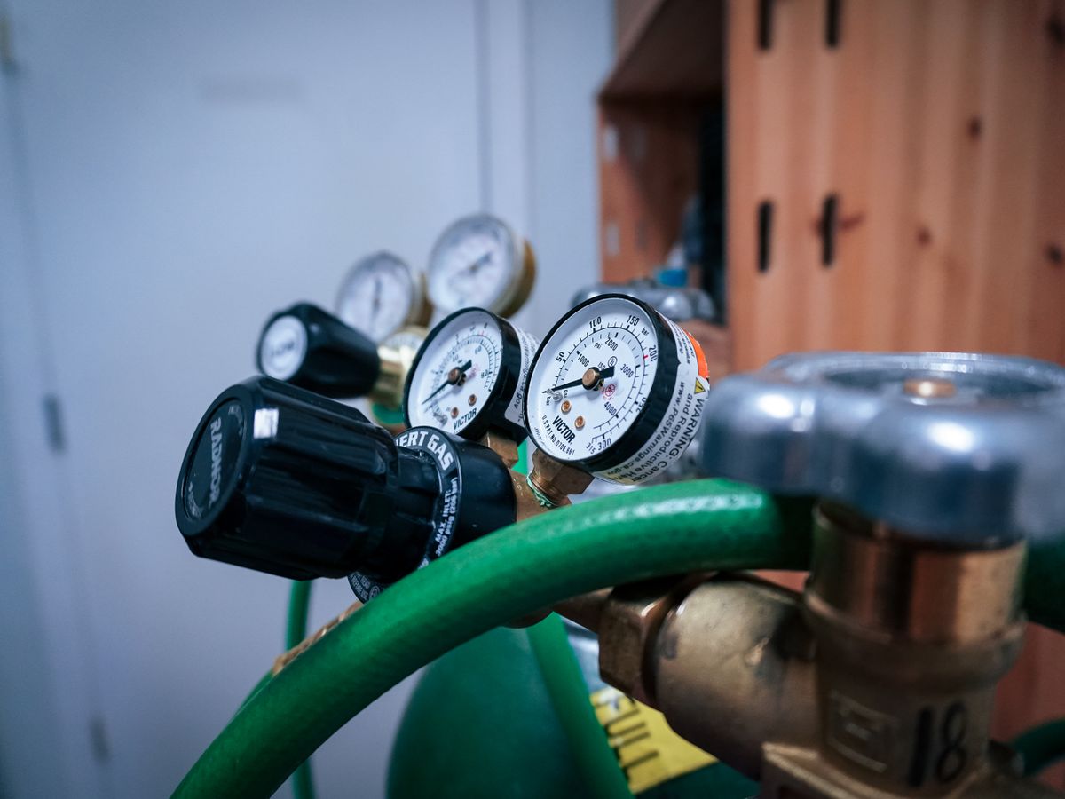 Close-up of pressure gauges on equipment.