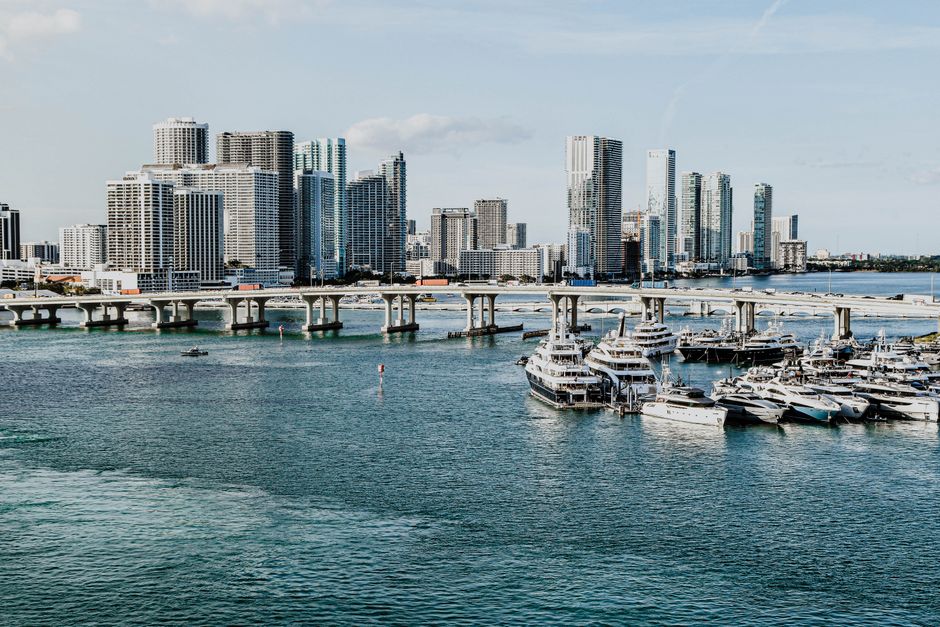Incredible Private Yacht Rental 37Ft in Miami Up to 12 People Review: Your Complete Guide to Miami's Best Value Yacht Experience Review 2026 - A scenic view of Miami skyline and marina, showcasing luxury yachts and modern skyscrapers under a clear blue sky.